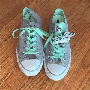 Grey and green converse